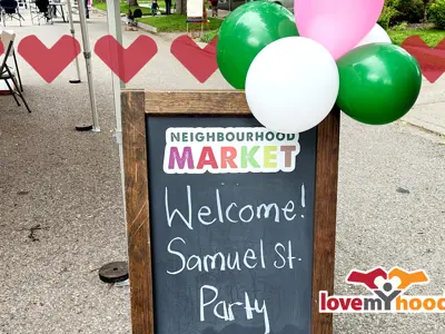 a chalkboard sign that says welcome to the Samuel Street party