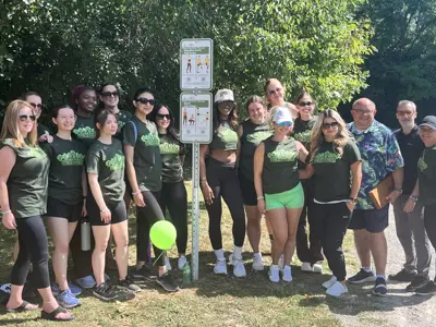 Group of people in front of the exercise sign
